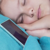 Kid cell phone next to head EMFs